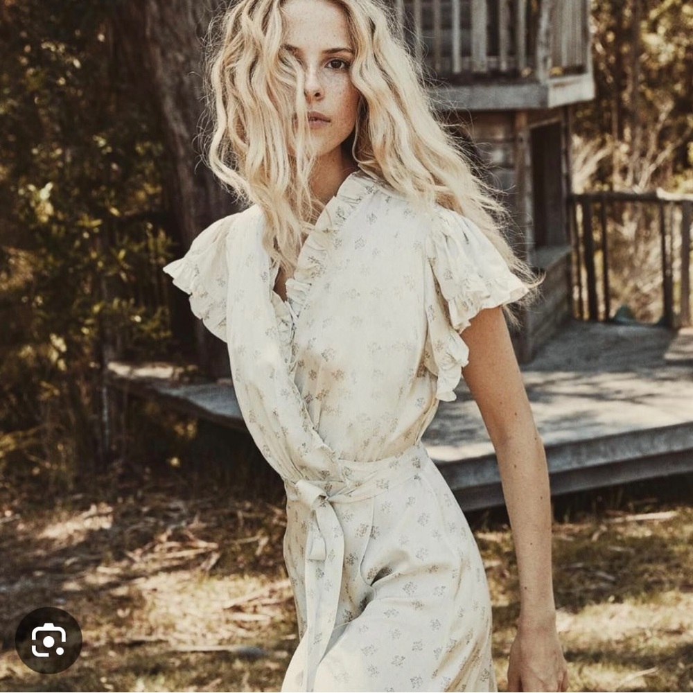 Silk Cypress Doen wrap dress with a light floral pattern